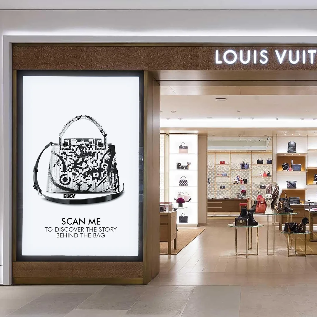 The Louis Vuitton ArtQrCode® displayed in a boutique window