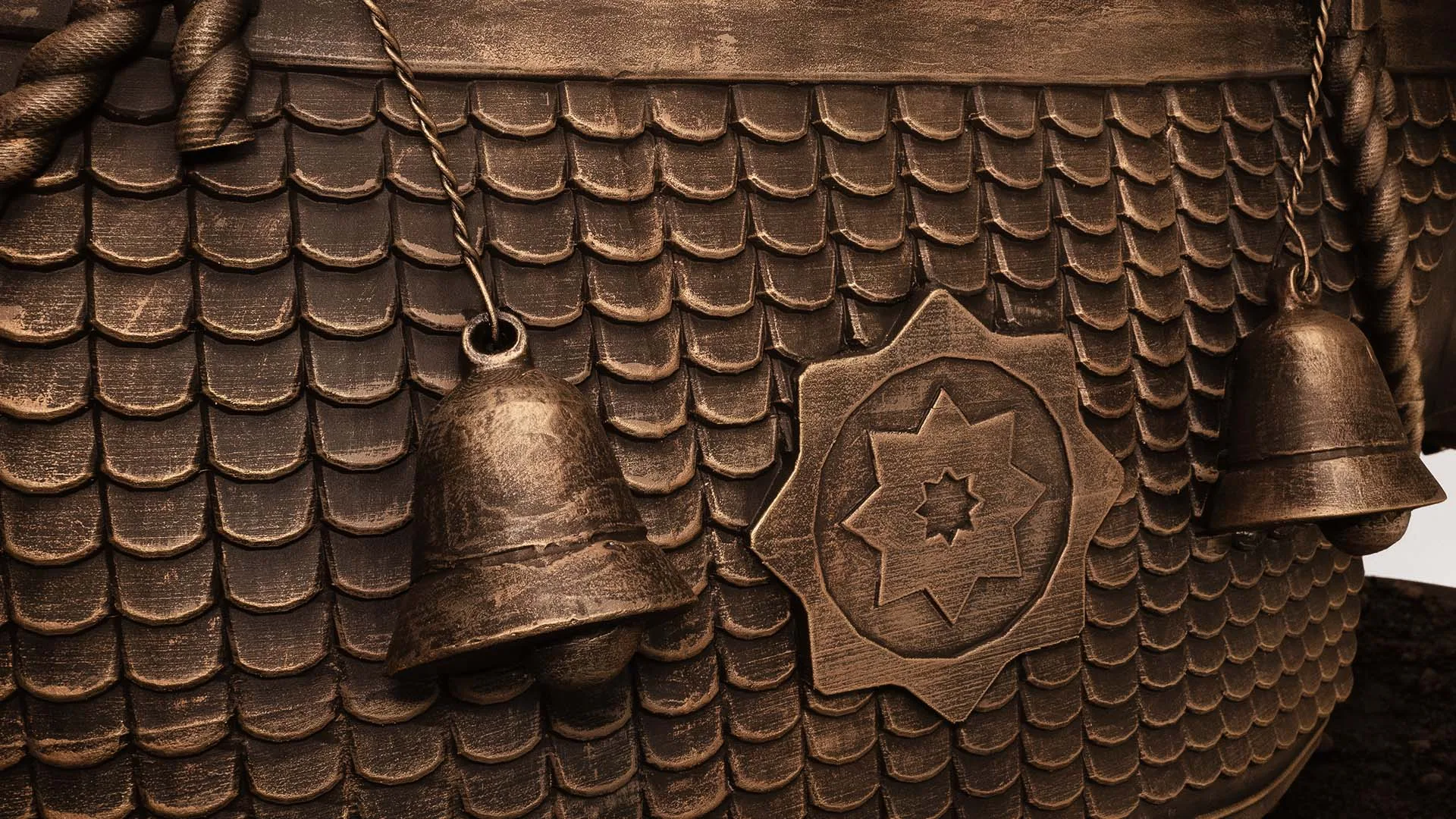 Sculpted detail of the harness and bells