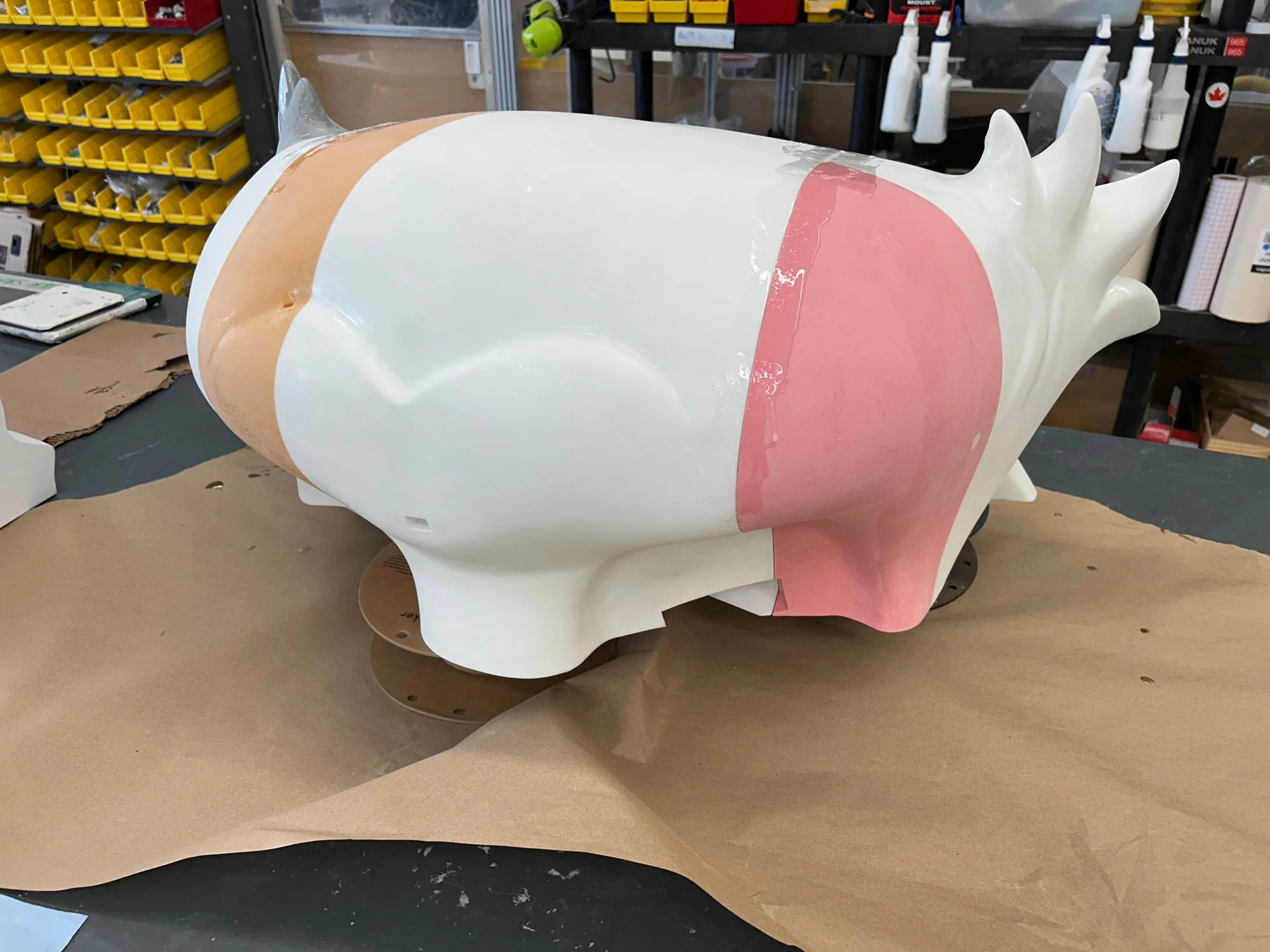 Masked body section during hand-painting