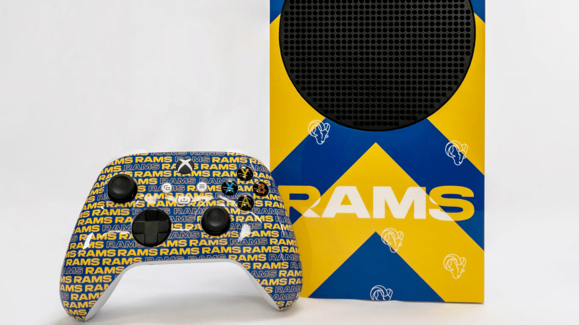 Custom Rams Xbox Series S console with chevron artwork and controller